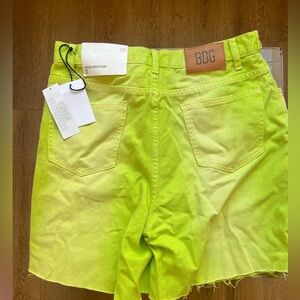 Urban Outfitter size 31 green neon shorts.